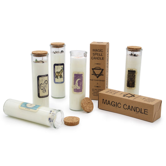Set of magic candles with labels and packaging on a white background