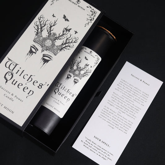 Witches' Queen candle packaging with black and white design on a dark background