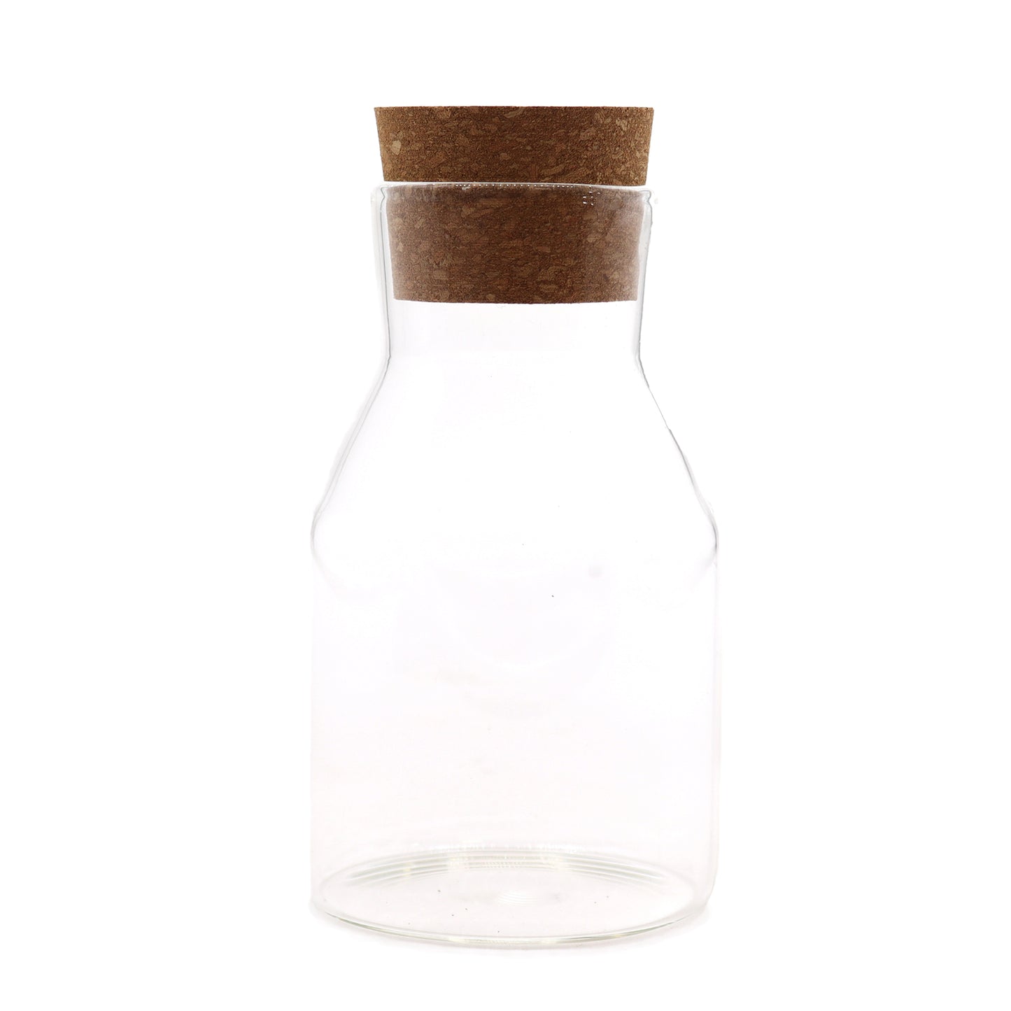 Clear glass carafe with a brown cork lid on a white background