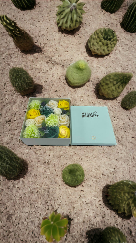 Close-up of vibrant yellow and green soap flower bouquet, artisan spring bath gift