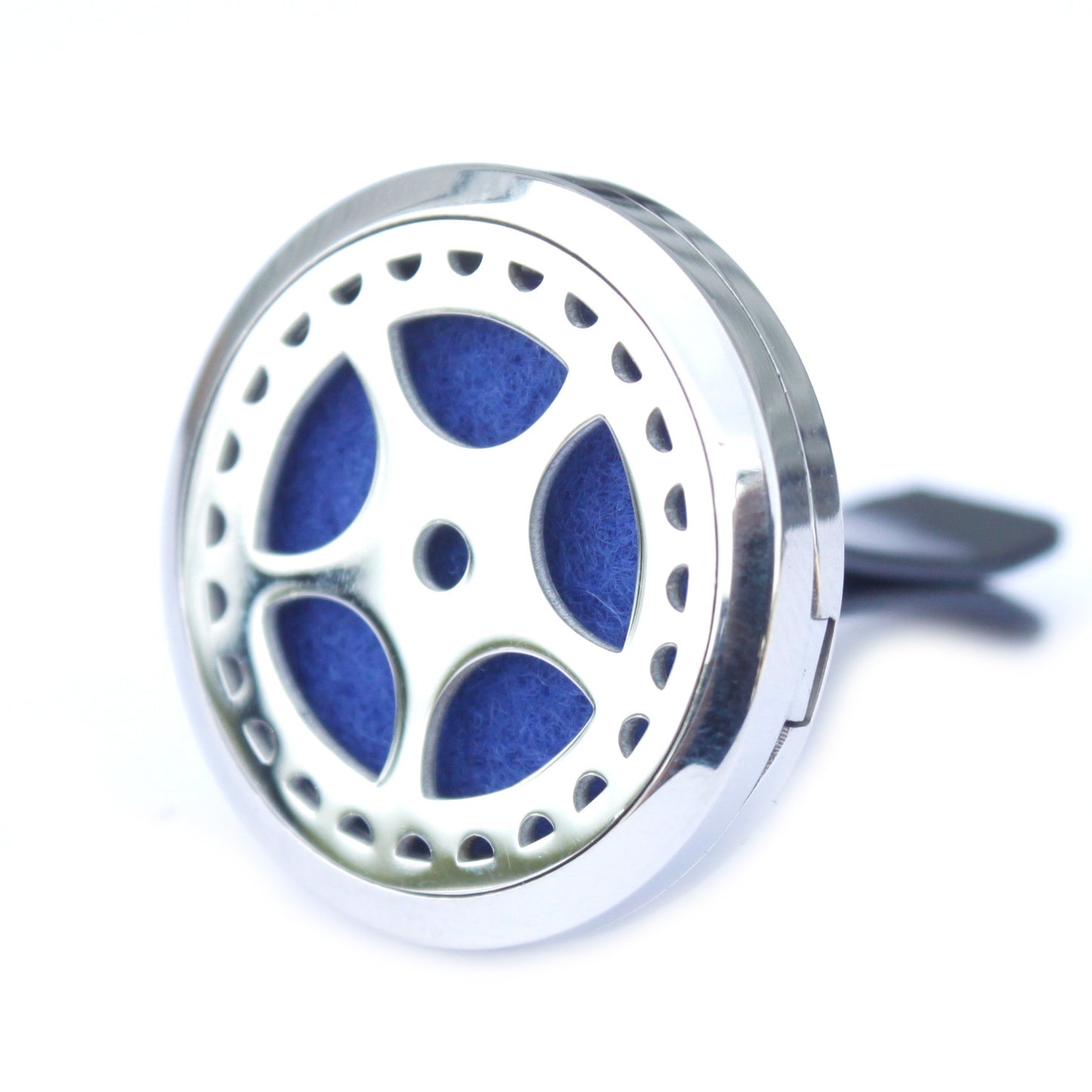 A stainless steel car diffuser kit with a green felt pad and a wheel design, including space for essential oil.Underground Allure, Essex UK