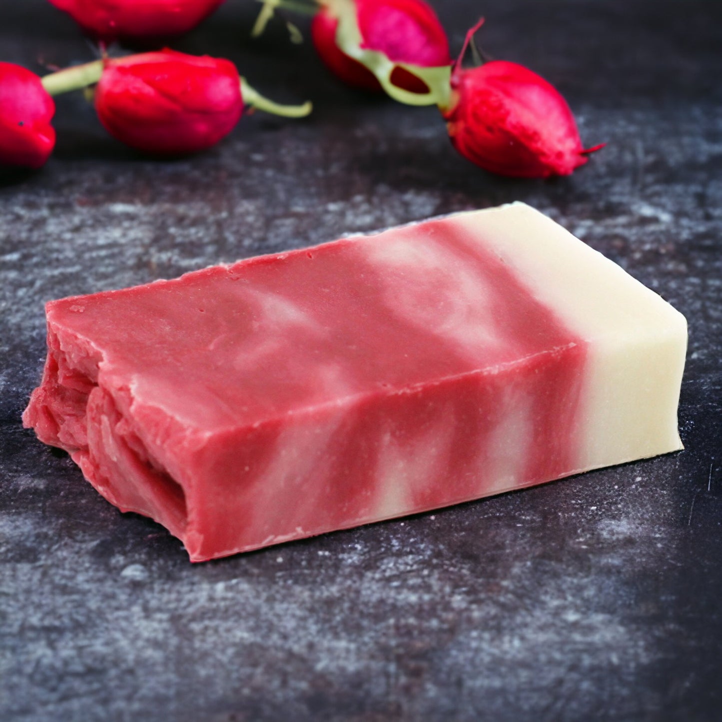 Rose hip Olive soap with flowwr in background