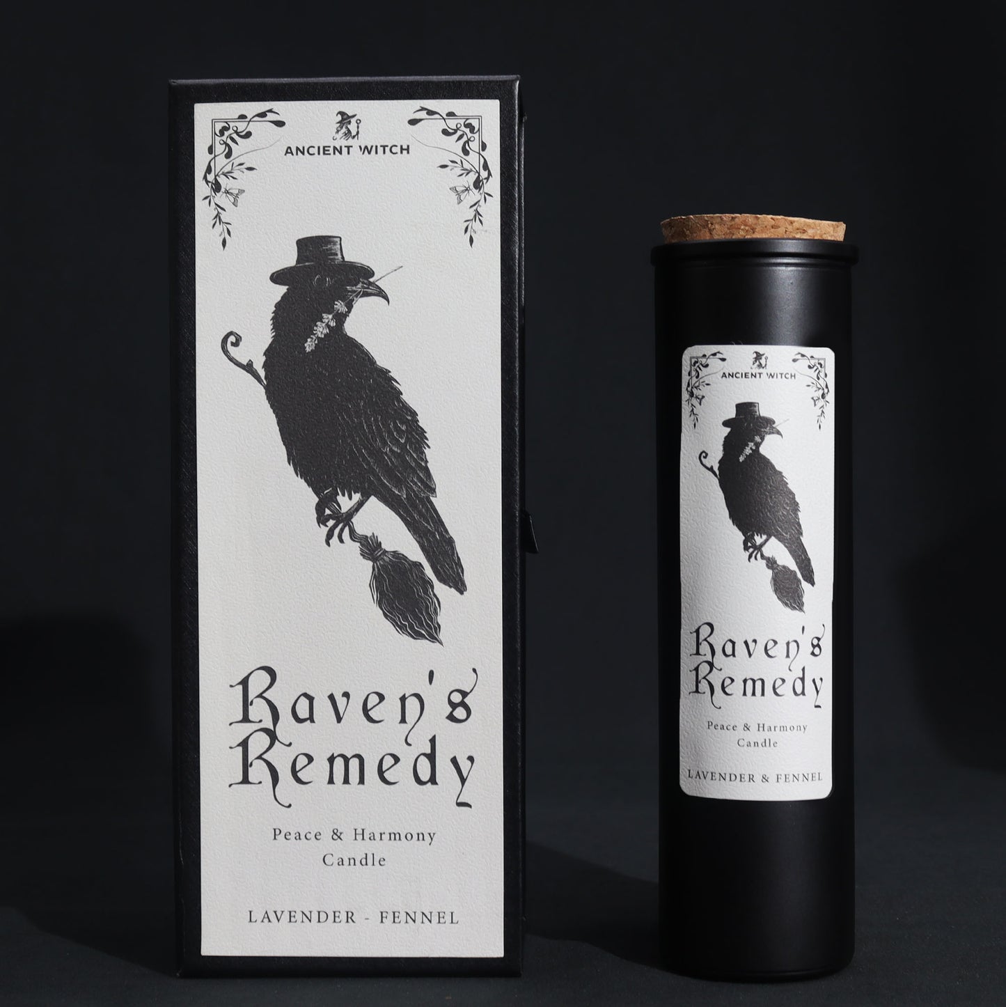 Upright view Candle packaging for 'Raven's Remedy' with a black and white design of a raven on a dark background.