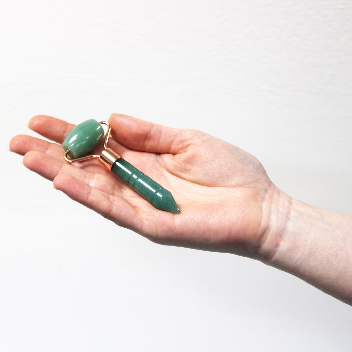 Jade face Roller against a white background