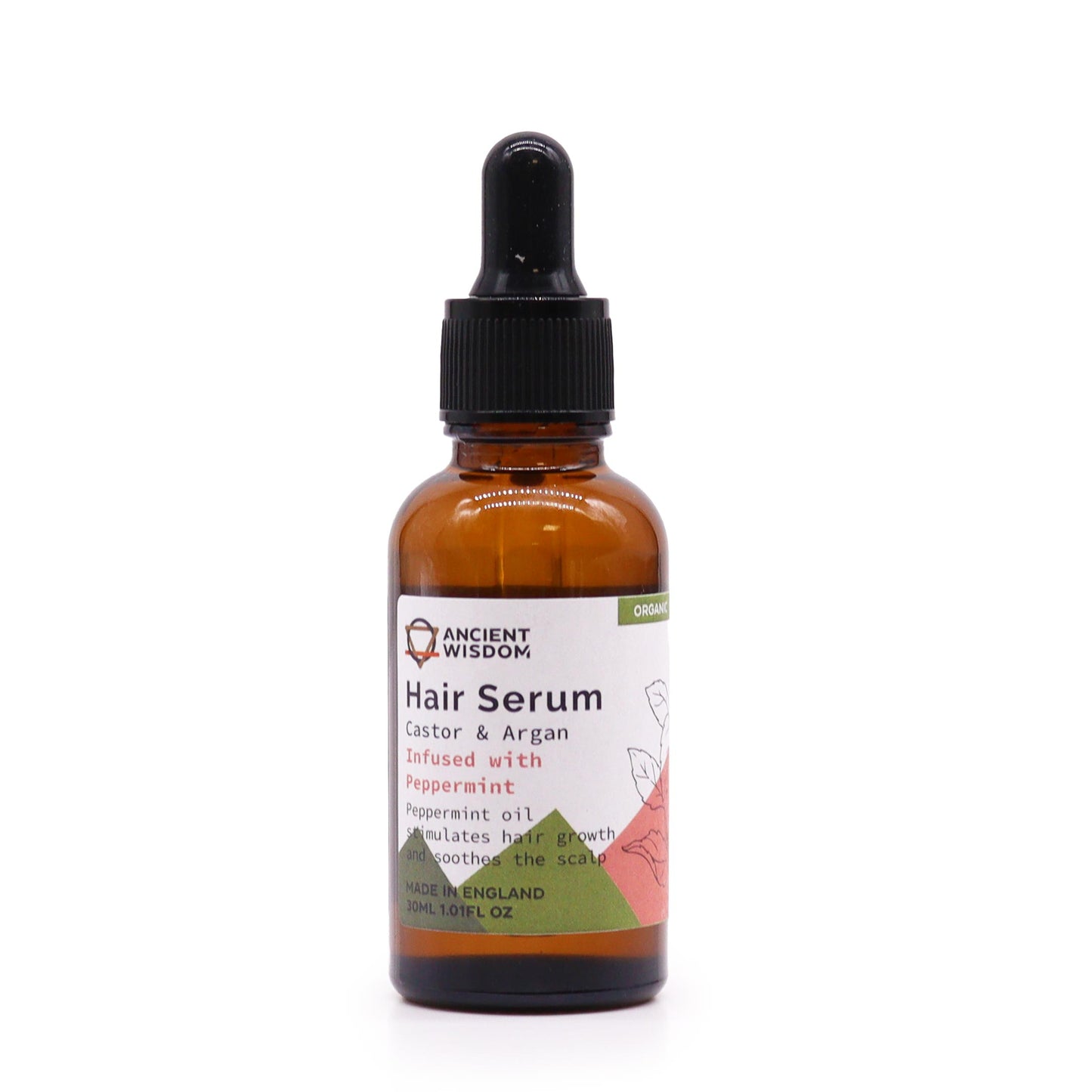 A bottle of Ancient Wisdom Organic Hair Serum with a label indicating 'Castor & Argan Oils' and 'Peppermint'. The bottle is amber-colored and has a dropper.