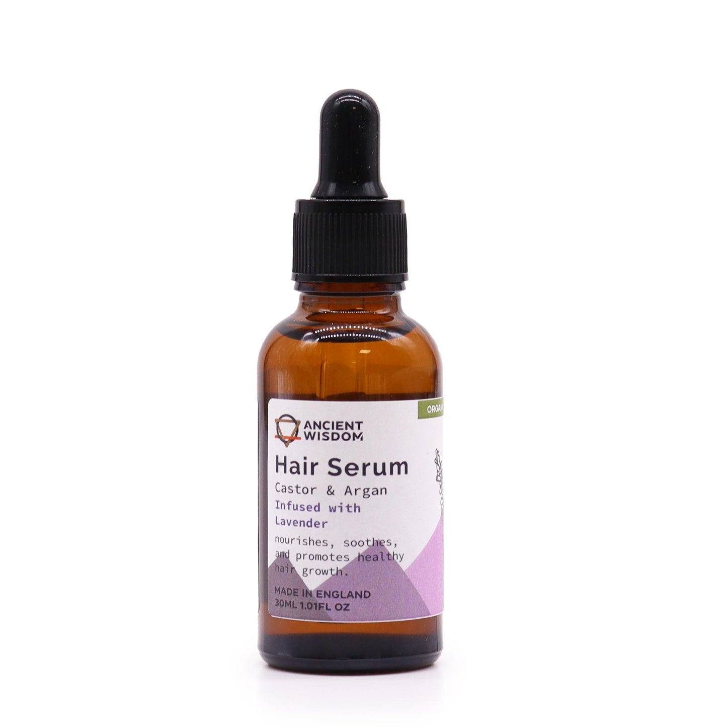A bottle of Ancient Wisdom Organic Hair Serum with a label indicating 'Castor & Argan Oils' and 'Lavender'. The bottle is amber-colored and has a dropper.