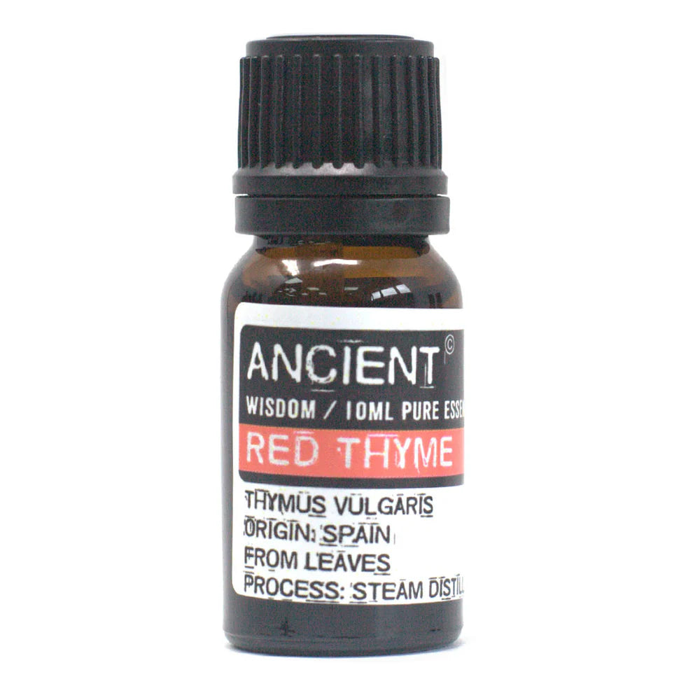 A bottle of Red Thyme Essential Oil with a label indicating it is a product of Spain, containing 10ml pure essential oil, steam distilled from leaves.