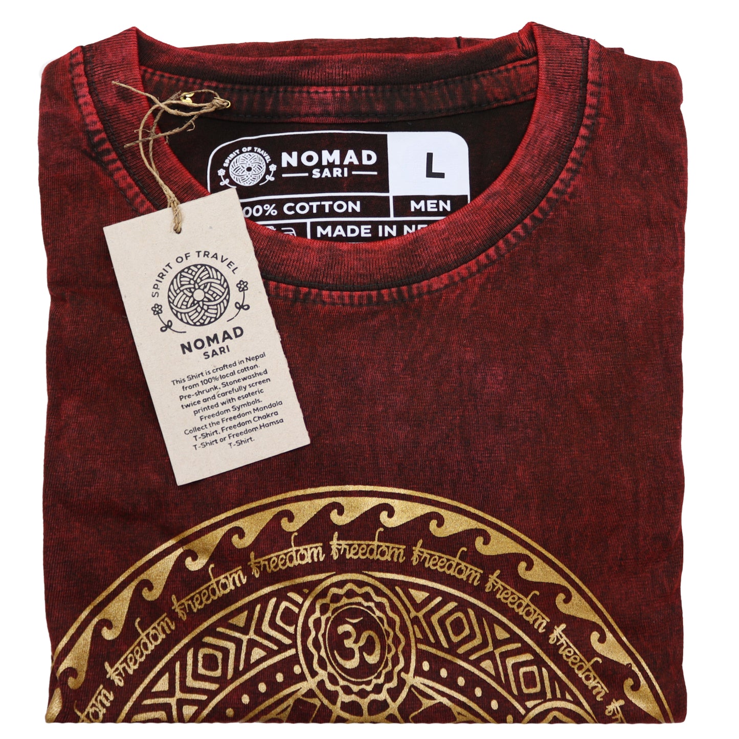 Folded maroon t-shirt with gold design and 'Nomad Sari' label on a white background