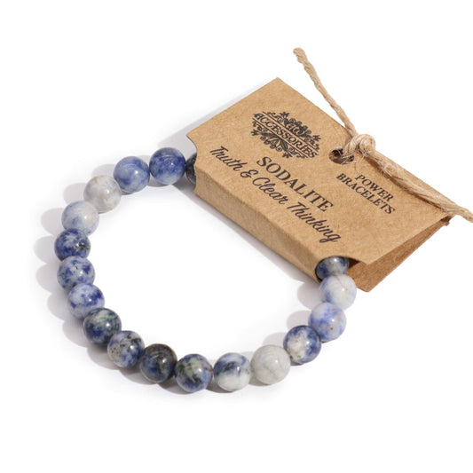 Sodalite beaded bracelet with a branded card on a white background
