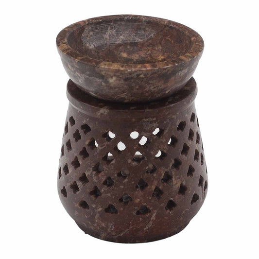 A collection of soapstone burners in various designs,