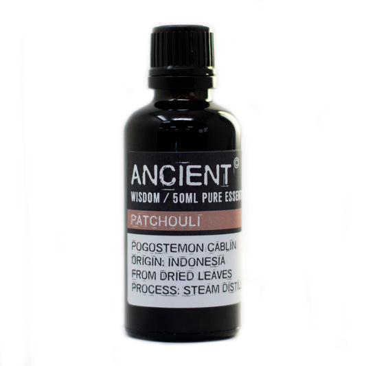 Bottle of Ancient Wisdom Patchouli pure essential oil on a white background