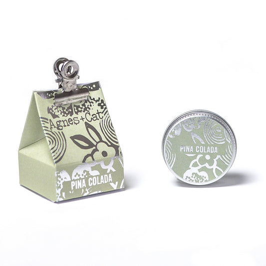 Agnes & Cat Pina Colada Lip Balm in packaging on a white background, Underground Alure