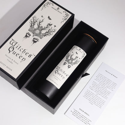 Witches' Queen candle in a black box with decorative design on a white background