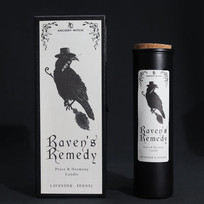 Upright view Candle packaging for 'Raven's Remedy' with a black and white design of a raven on a dark background.
