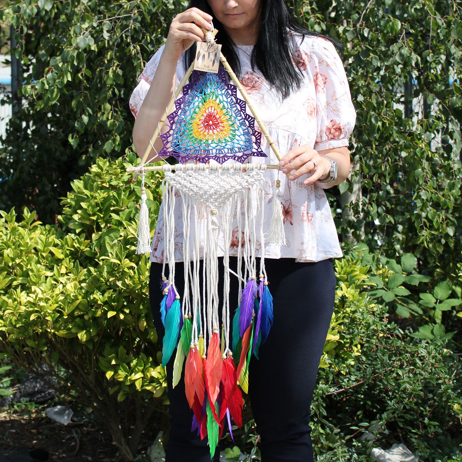 a women holding a Bali Dream Catchers - Med Multi Pyramid