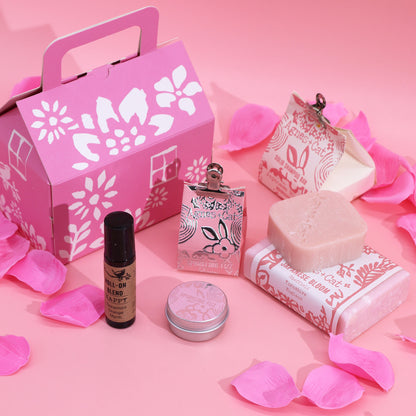 Agnes & Cat Pink beauty box with skincare products on a pink background