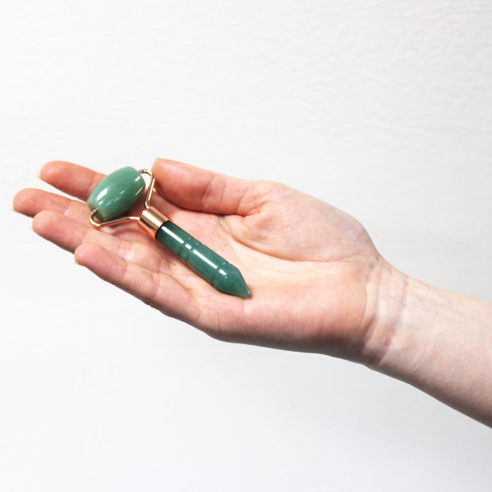 Jade face Roller against a white background