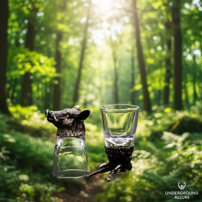 Two  50ml shot glasses with Hog heads nozzles in a forest setting