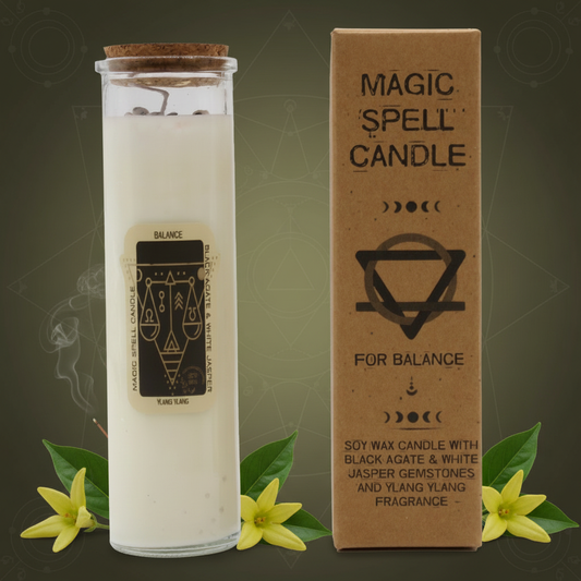 Magic spell candle for balance with packaging on a dark background