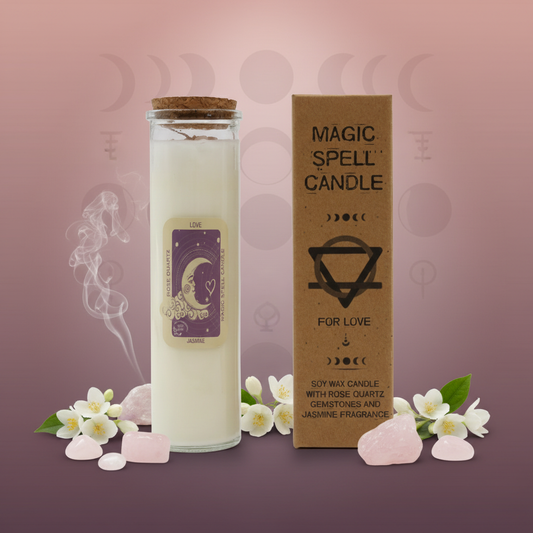 Magic spell candle with packaging and flowers on a pink background
