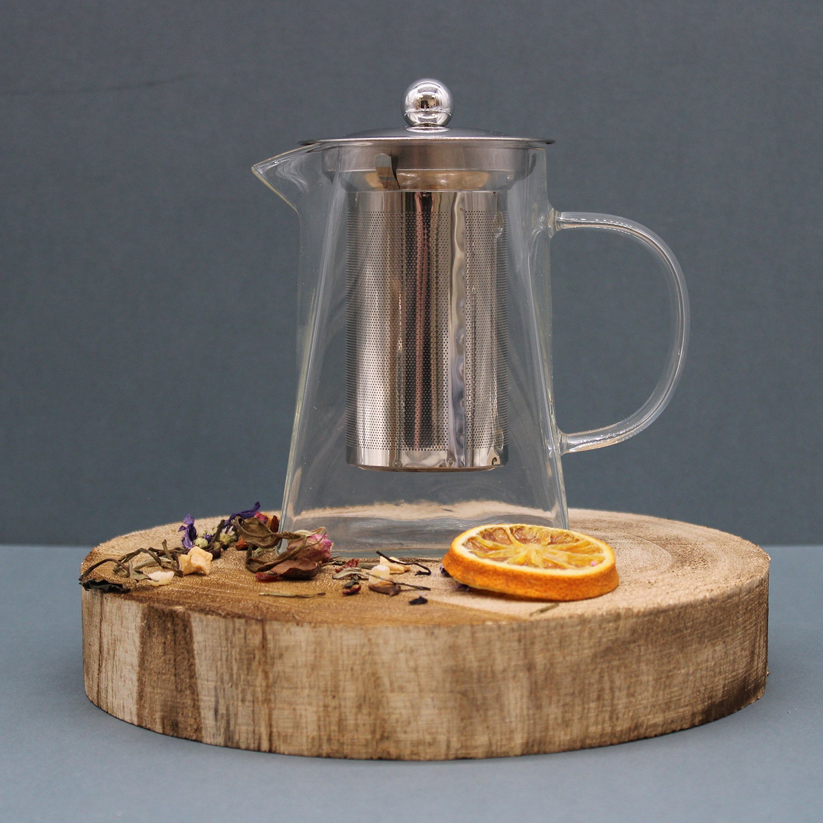 sitting on a wooden display plate - Glass Infuser Teapot - Tower Shape - 750ml