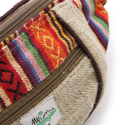 Colorful woven bag with a visible brand label on a white background