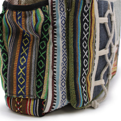 Colorful woven bag with geometric patterns on a white background