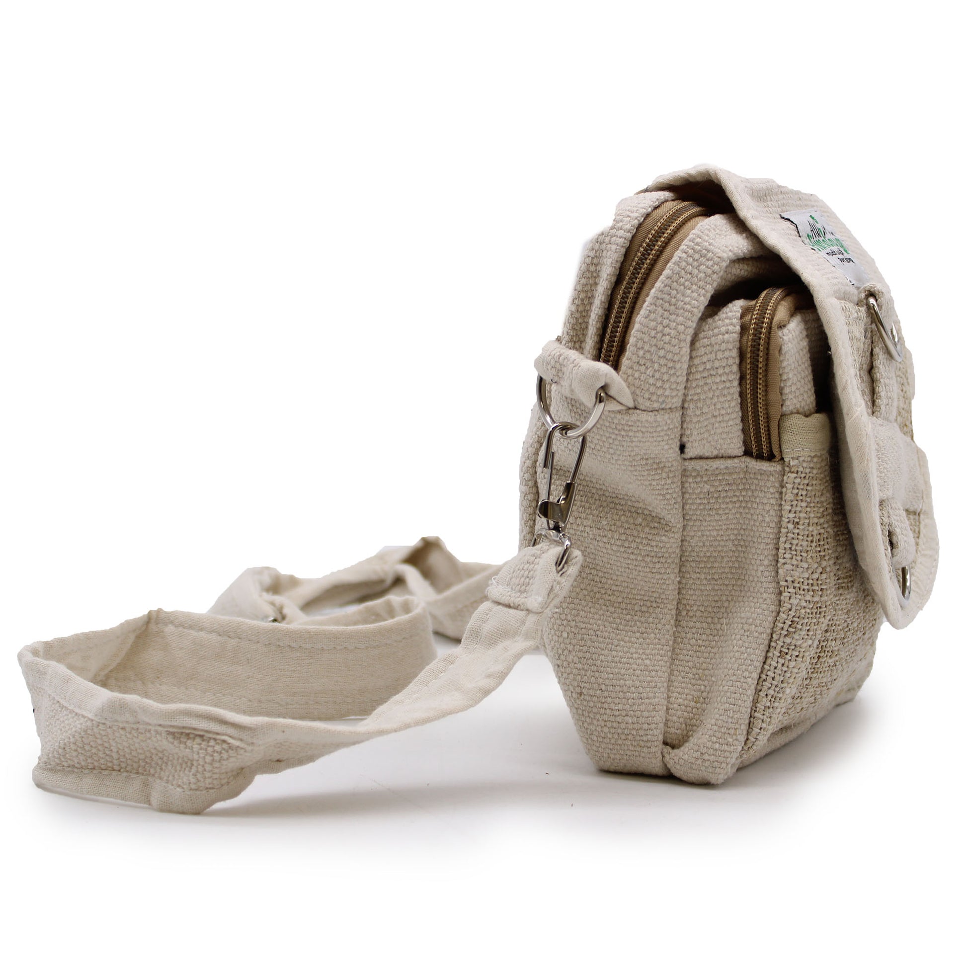 Beige fabric bag with zippers on a white background