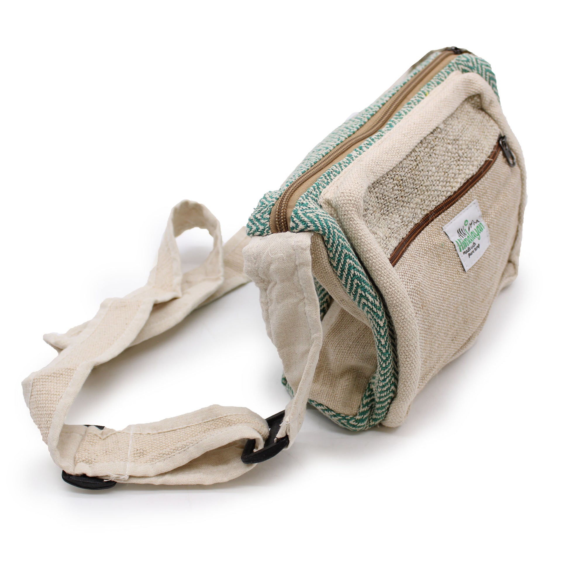 Beige waist bag with green accents and a visible brand label on a white background