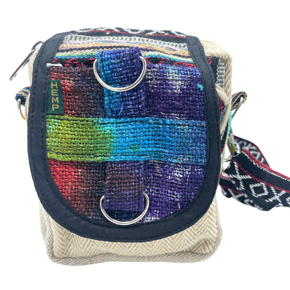 Multicolored woven bag with a strap on a white background