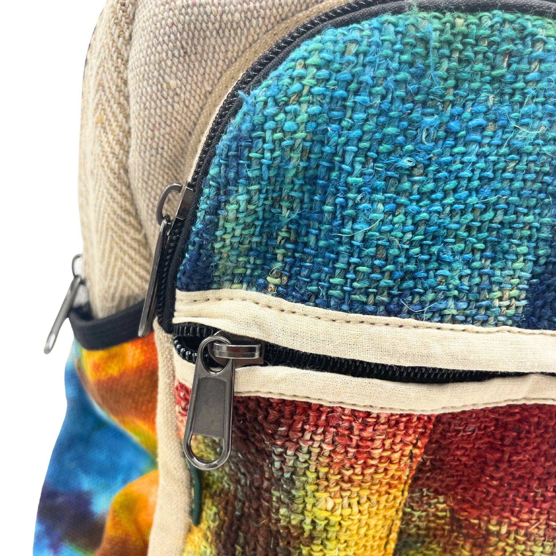 Multicolored woven bag with a zipper on a white background