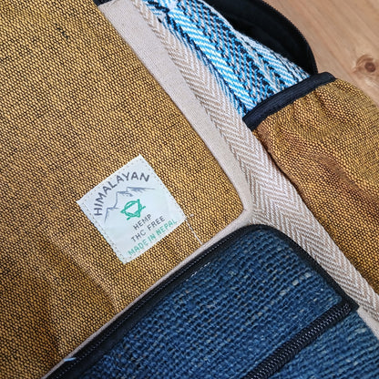 Close-up of a fabric product with a Himalayan Hemp label on a wooden surface