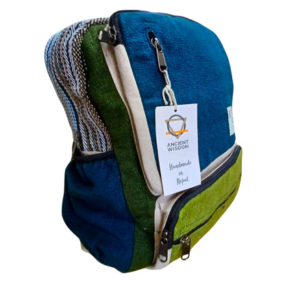 Multicolored fabric bag with a visible brand tag on a white background