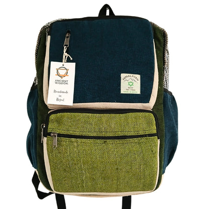 Green and navy backpack with visible brand labels on a white background
