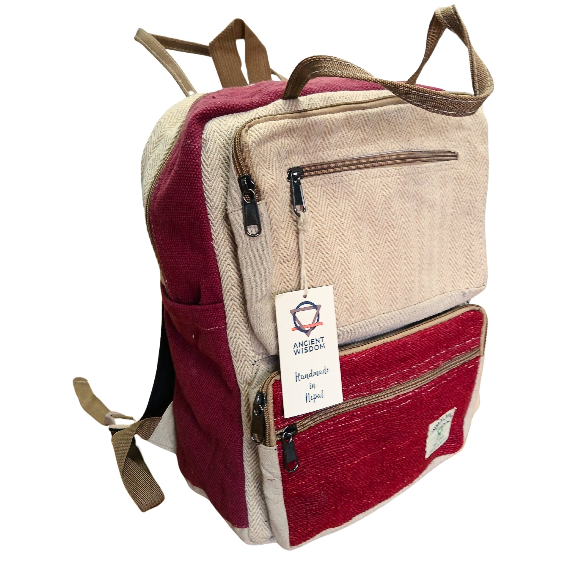 Backpack with red and beige sections and a visible brand tag on a white background