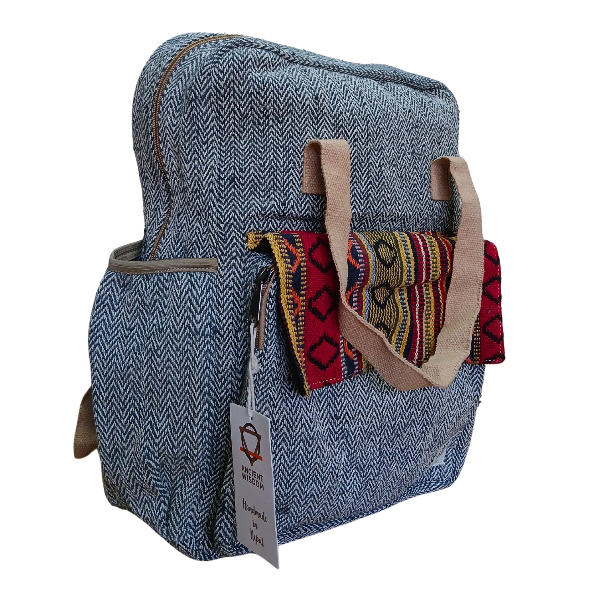 Blue textured backpack with colorful patterned straps on a white background