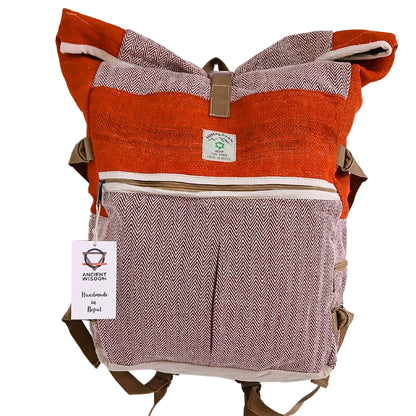 Orange and brown patterned backpack with a visible brand tag on a white background