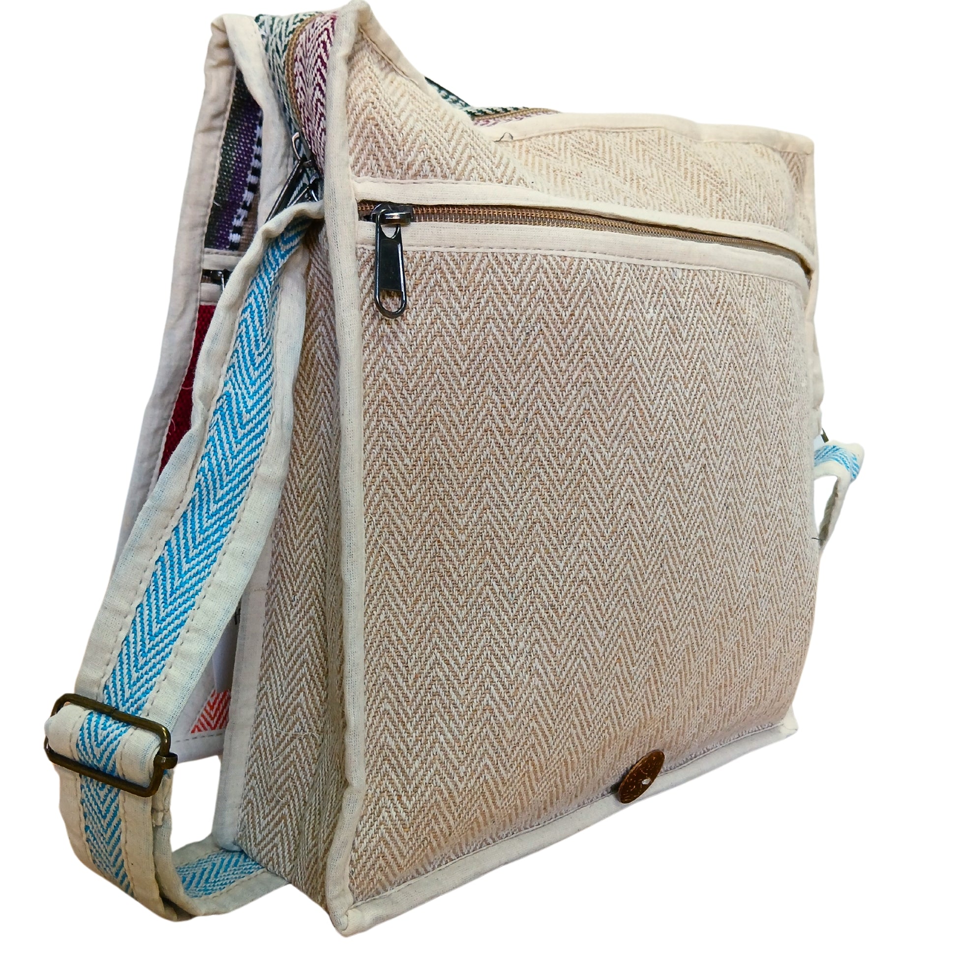 Beige woven shoulder bag with a blue strap on a white background