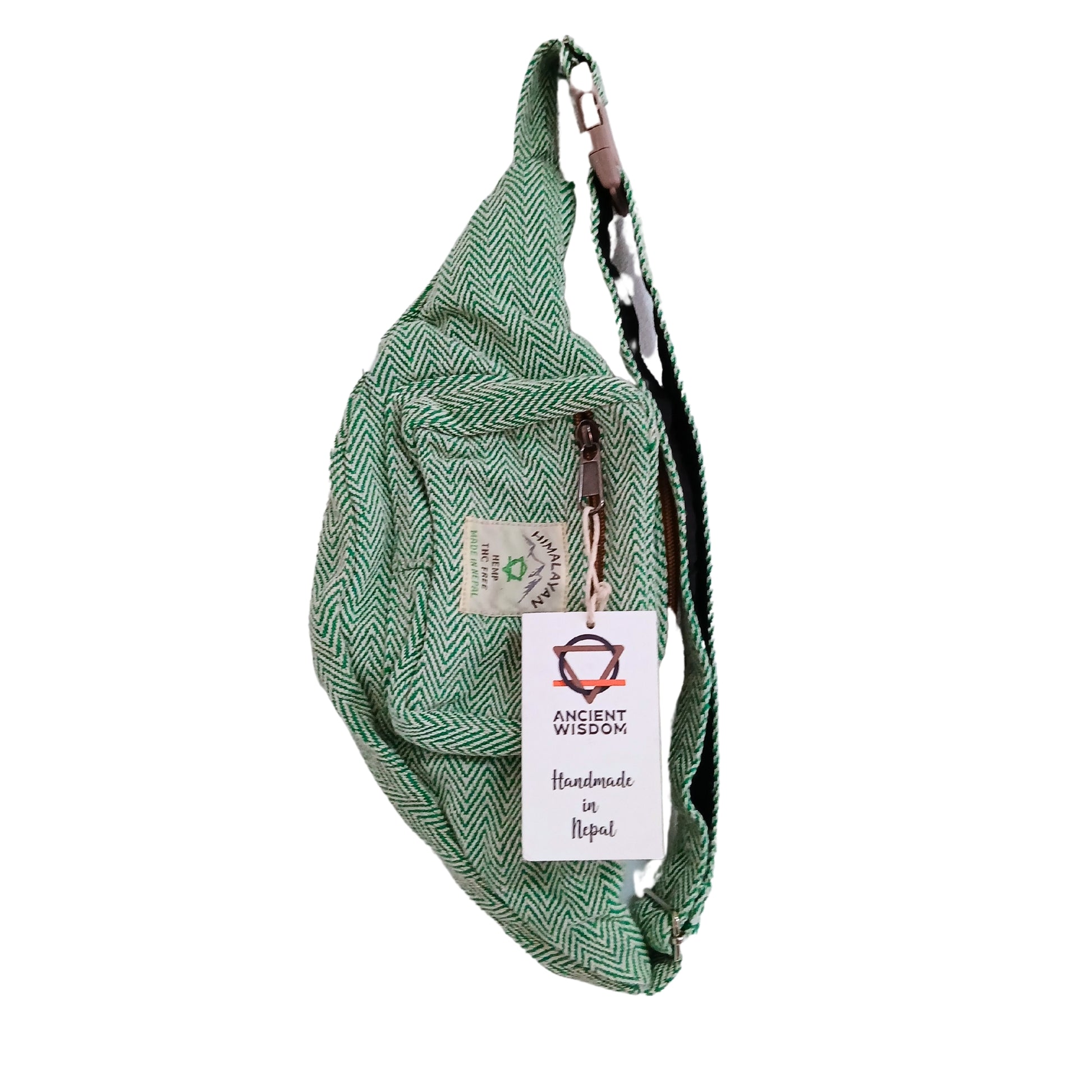 Green woven sling bag with a tag on a white background