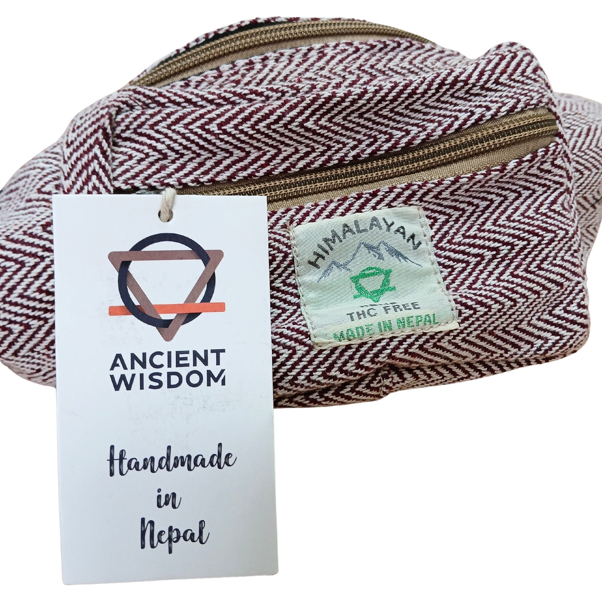 Herringbone-patterned pouch with 'Ancient Wisdom' label and 'Himalayan' tag on a white background