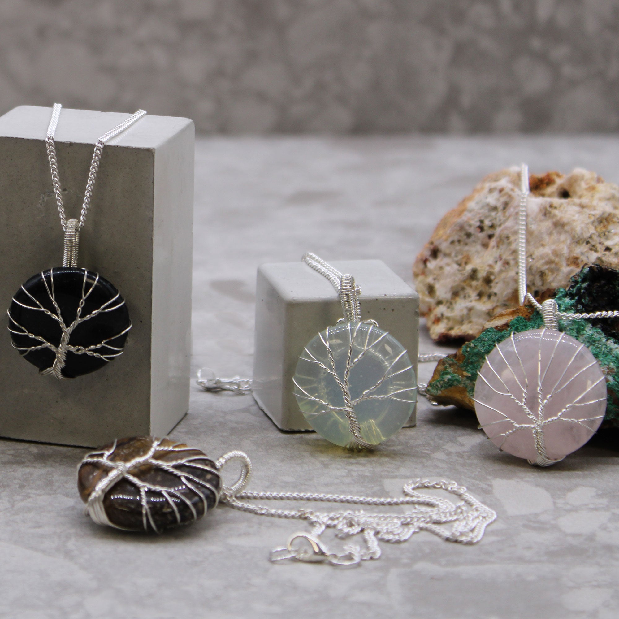 Tree of Life Gemstone Necklace - Opalite on a display stand