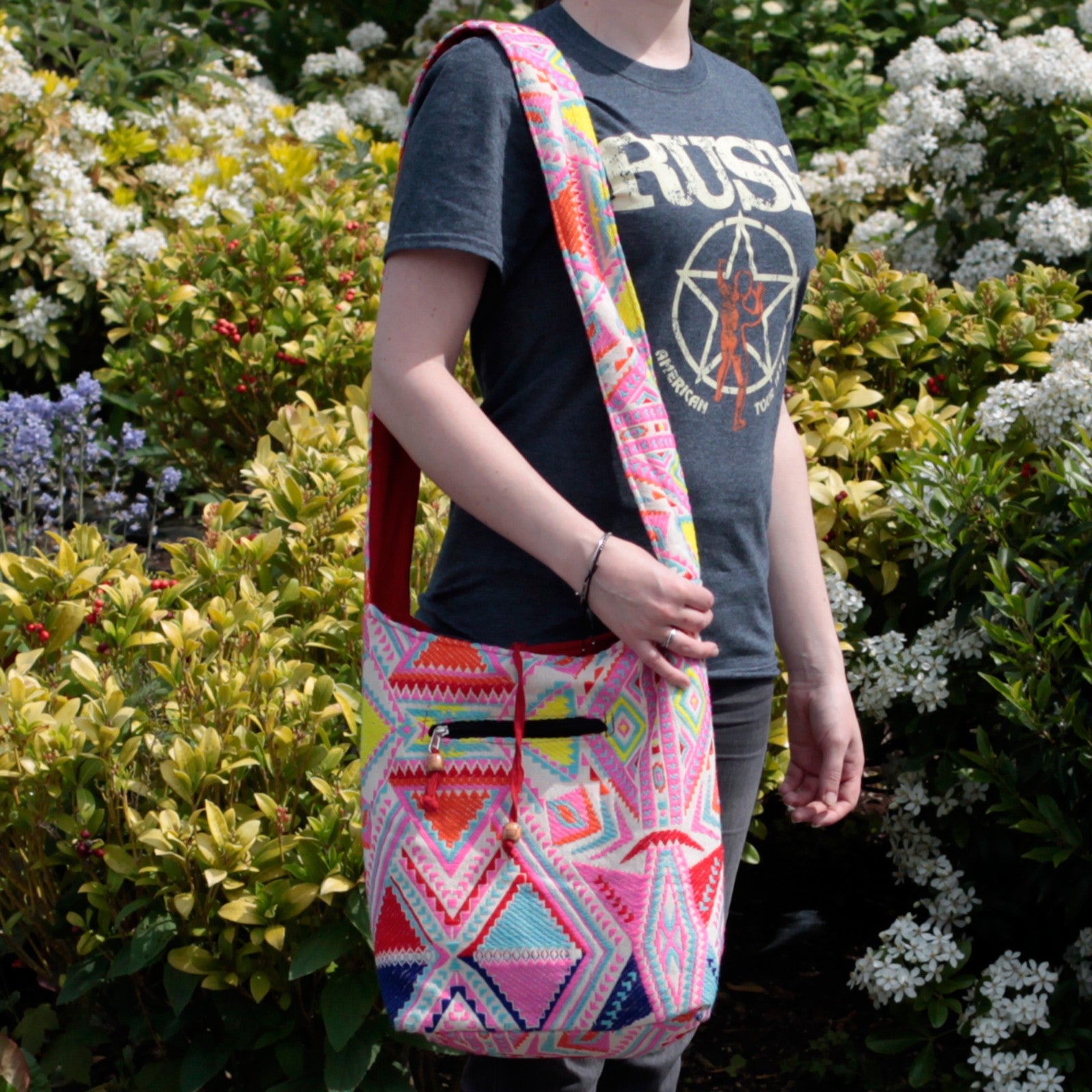 women wearing her Kathmandu Big Bag - Midday over her shoulder front view