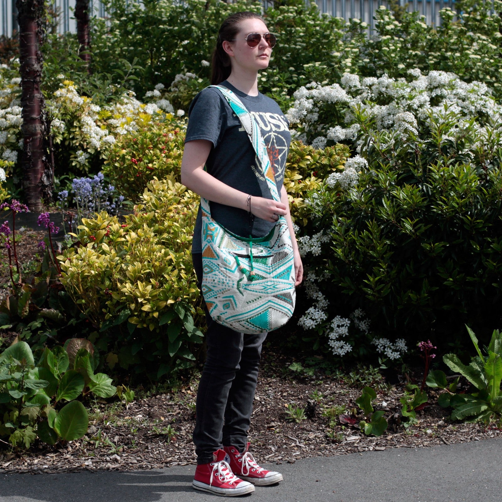 women wearing her Kathmandu Big Bag - Midday over her shoulder