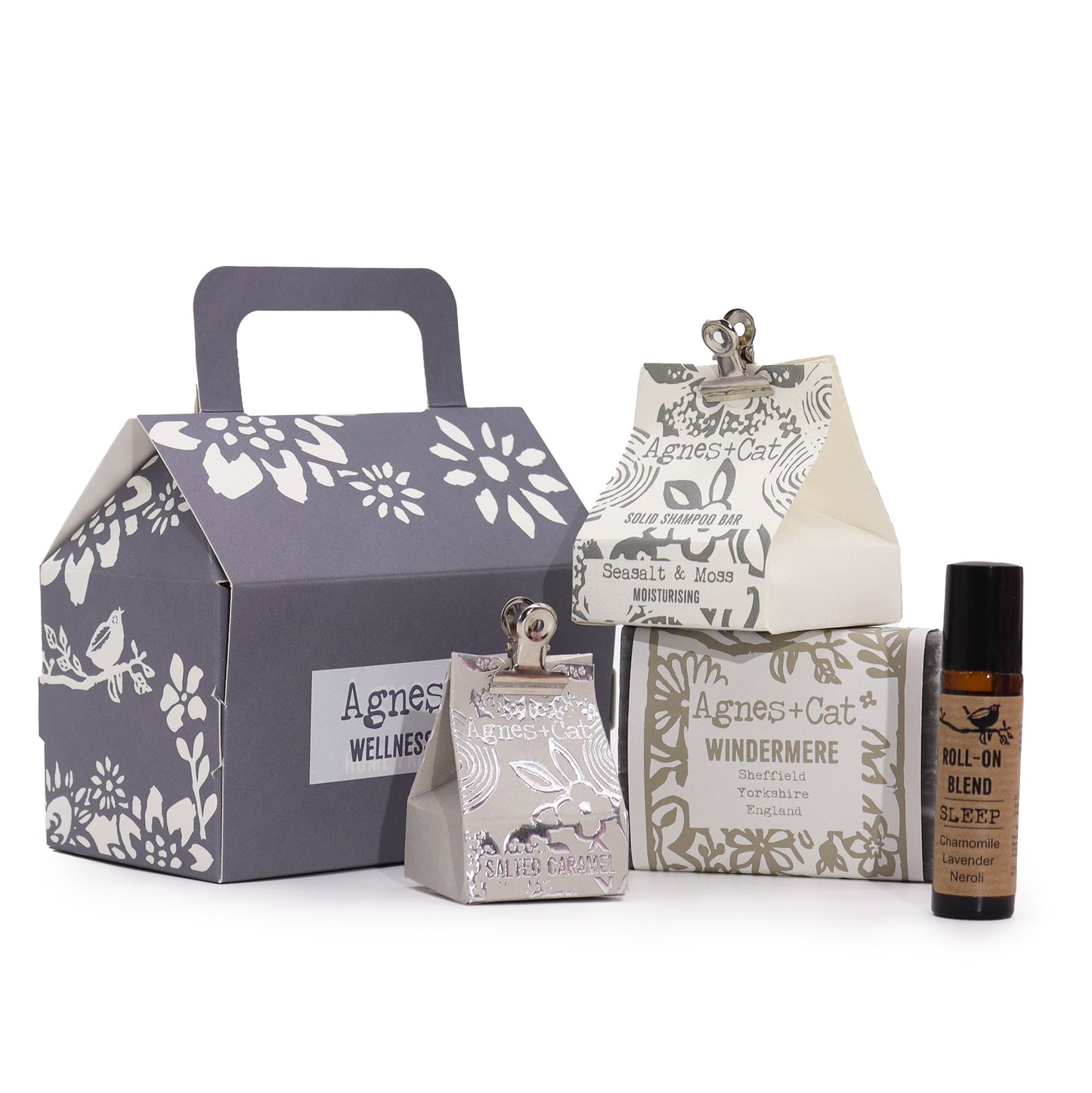  WindermereCollection of Agnes + Cat wellness products including a box, bottle, and other packaging on a white background.