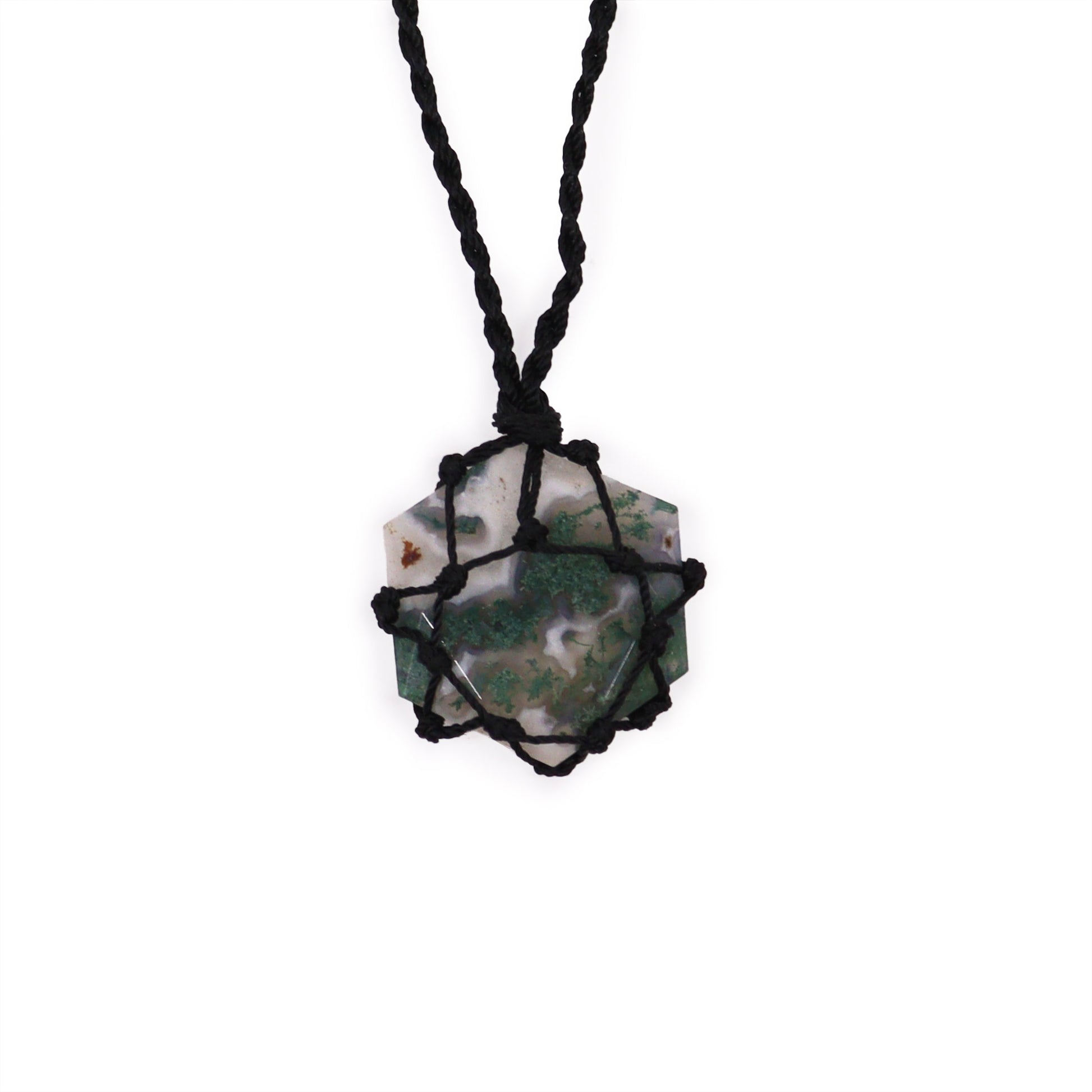 Laced Gemstone Hexagon Pendant - Moss Agate on a black cord against a white background