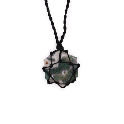 Laced Gemstone Hexagon Pendant - Moss Agate on a black cord against a white background