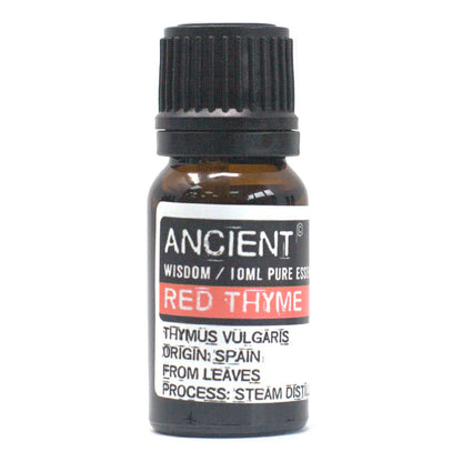 A bottle of Red Thyme Essential Oil with a label indicating it is a product of Spain, containing 10ml pure essential oil, steam distilled from leaves.