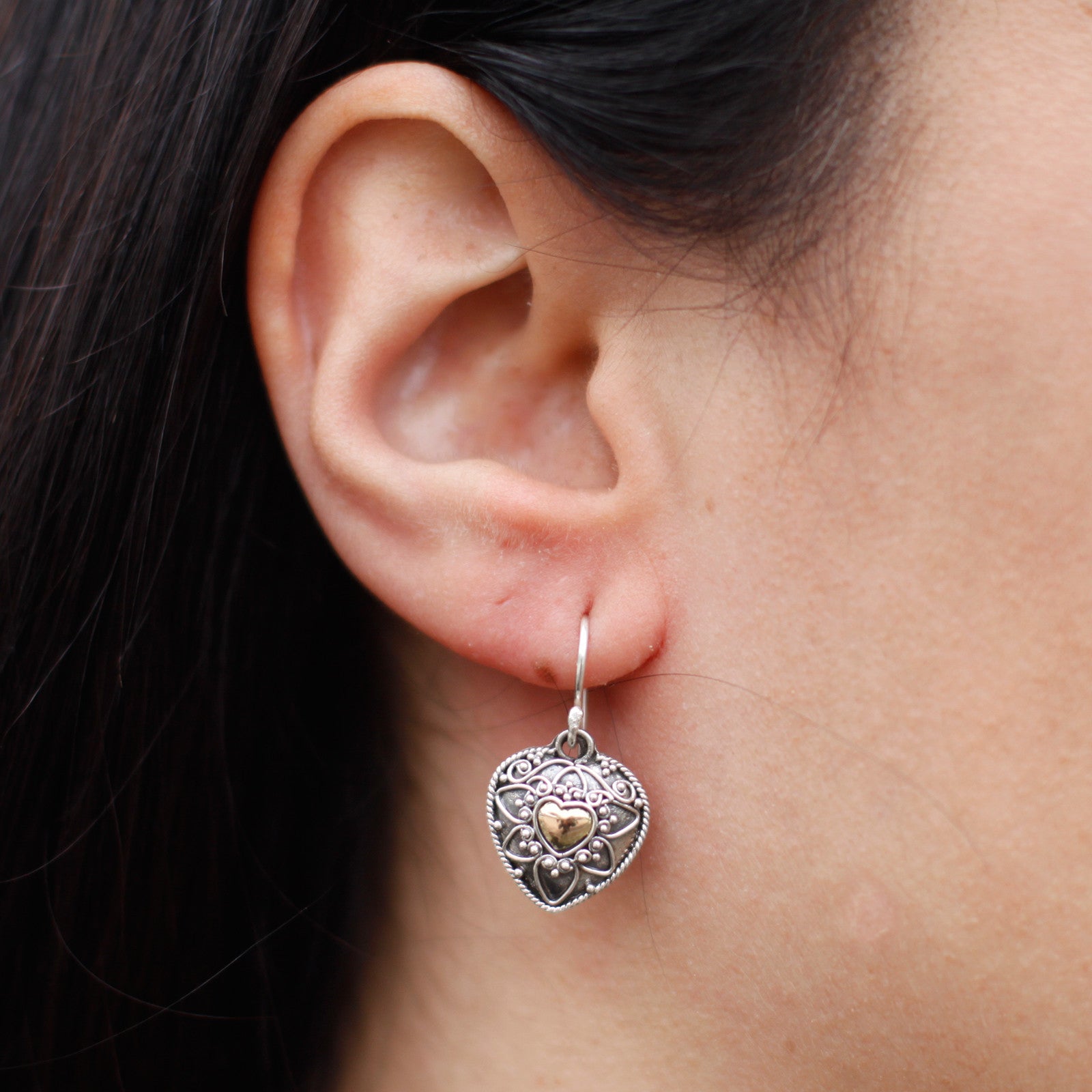 Ear shot of Silver & Gold Earring - Mandala Hearts * Height with Drop: 3.2cm * Fitting: Hook * Metal: 18k Gold & 925 Silver * Weight: 3 grams (combined)close up ear shot of Silver & Gold Earring - Mandala Hearts * Height with Drop: 3.2cm * Fitting: Hook * Metal: 18k Gold & 925 Silver * Weight: 3 grams (combined)