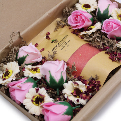 close up shot of Passion Set A 350g Bath Salt infused with Ylang Ylang, Lemon, and Orange.  8 Soap Roses.  8 Soap Sunflowers.