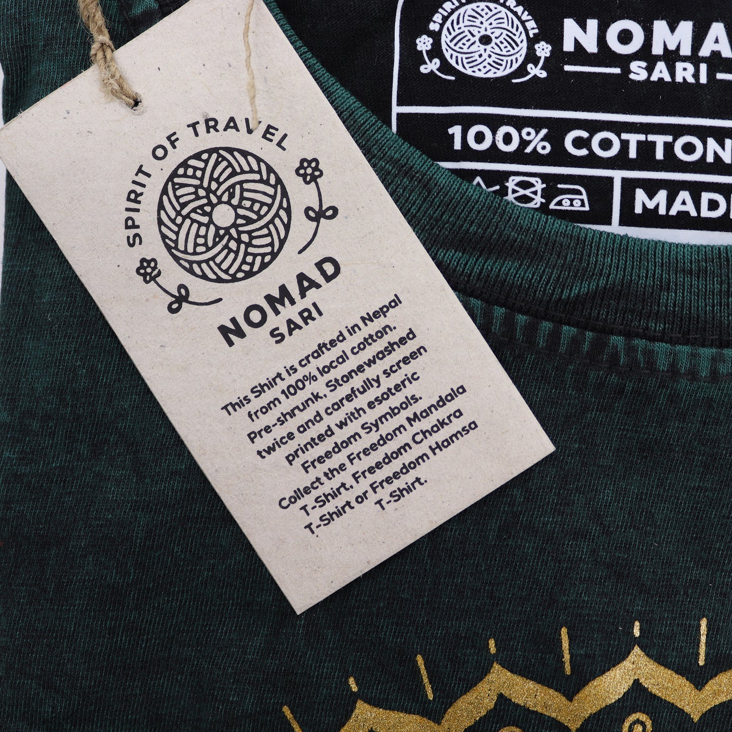 Nomad Sari shirt with a label detailing the shirt's features.